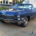 1968 Cadillac DeVille Convertible Blue w/ white top & leather interior