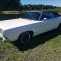 1968 Ford Galaxie LTD. white with black vinyl top.