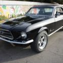 1968 Ford Mustang black on black, brand new wheels, wood interior