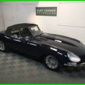 1968 JAGUAR E-TYPE XKE 4.2 LITER SERIES 1.5 ROADSTER. DARK BLUE WITH GREY TRIM.