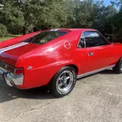 1969 AMC AMX Red it is tagged and insured for the last 3 yrs