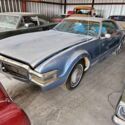 1969 Blue Oldsmobile Toronado Coupe 2D