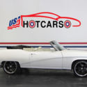 1969 Buick Skylark Convertible - Pearl White on White with Black Top.