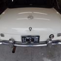 1969 MGB roadster with overdrive. White with brown leather interior.