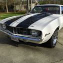 1969 z28 Camaro - White, Black Stripes, Red Interior