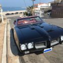 1970 GTO convertible, original Black w/ red interior. 400 v8, 400 automatic