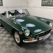 1970 MGB ROADSTER. BRITISH RACING GREEN WITH BLACK TRIM AND SOFT TOP. 4-SPEED.