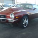 1972 Chevy camaro Z28 4 speed. Burnt orange 355 aluminum heads small cam.