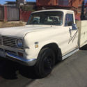1973 INTERNATIONAL 1310 WITH WINCH BOOM AND UTILITY BED NO RESREVE!