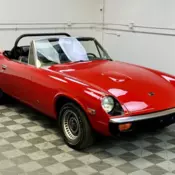 1973 JENSEN HEALEY ROADSTER. RED WITH BLACK TRIM AND TOP.