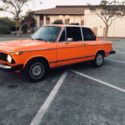 1974 BMW 2002; 4sp, Inka Orange/Black interior, no sunroof, all stock, 186k,