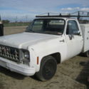 1974 Chevy Silverado 10. Running. Has utility bed body.