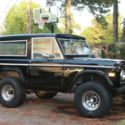 1974 FORD  BRONCO.  Black exterior, Blue interior.