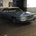 1974 Pontiac Grand Ville with factory air conditioning.  Nice relaible driver.