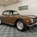 1974 TRIUMPH TR-6. SIENNA BROWN ON BLACK. EXCELLENT ORIGINAL WITH 67,318 MILES.