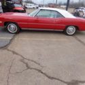 1975 CADILLAC CONVERTIBLE RED, WHITE TOP, WHITE INTERIOR