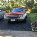 1976 AMC GREMLIN RED & WHITE LOW MILEAGE RUNS GOOD VERY CLEAN INSIDE AND OUTSIDE