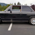 1976 BMW 2002 4spd with rust and cheap wheels