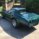 1976 Chevrolet Corvette 4 Speed Muncie Trans, Dark Green metallic.