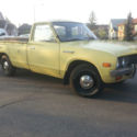 1976 Datsun 620 pickup with the original camper