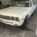 1976 datsun pickup truck - bullet side