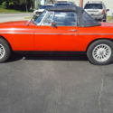 1976 MGB Orange, 2 Door, Convertible, GREAT condition.