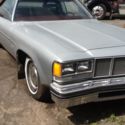 1976 olds delta 88 silver with red top