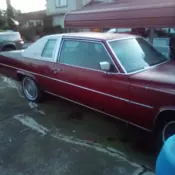 1977 Cadillac DeVille Coupe Coupe Red RWD Automatic