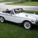 1977 MG MIDGET CONVERTABLE PEARL WHITE W/ NAVIGATION RUST FREE UPGRADED