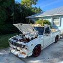 1977 Toyota Hilux pickup, coilover suspension, 22R/20R 5spd, 40 sidedraft webers