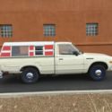 1978 Datsun 620 pickup, white, 5-speed, L20B 4 cyl. engine, camper top