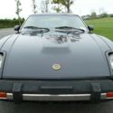 1981 Datsun 280-Z with black exterior paint and a tan leather interior