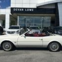 1982 Buick Riviera Convertible White with white top and maroon leather Int