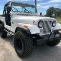 1982 Jeep C J -7 Laredo C5 speed 4x4, power steering, power brakes Factory Tach