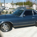 1983 Blue 380 SL Mercedes, fair condition, coup convertible with hard top.