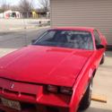 1983 Chevrolet Red Camero 4-speed,bucket seats, 4 cyl., 5,400 original miles.