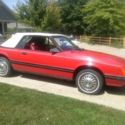 1983 ford mustang GLX convertible v-6 . The car is a classic . Little rust . eng