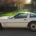 1984 CHEVY CORVETTE WHITE ,95K MILES W/GLASS TARGA  TOP.