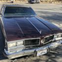 1984 Oldsmobile Delta 88 Coupe Red RWD Automatic ROYALE BROUGHAM