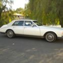 1985 Beautiful CADILLAC SEVILLE  White Vinyl Top, Sedan, 163,380 miles runs good