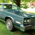 1985 Blue CADILLAC ELDORADO BIARRITZ w/ White Convertible Top & 6.0 L Engine