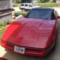 1985 Corvette red with removable glass top