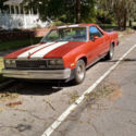 1985 GMC Cabellero / Rust/orange with white stripe