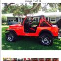 1985 Lipstick red CJ jeep 6 cylinder with lift kit 6 cylinder