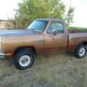 %1986 dodge  w150 short bed slant 6 4 speed   A/C  dry western truck watch video