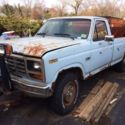1986 Ford F-250 pick up truck with plow and spreader