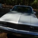 1987 El Camino silver w/1990 corvette engine 65k miles 4-speed auto trans.