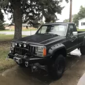 1987 Jeep Comanche Pickup Black lifted 4x4