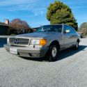 1987 Mercedes 560 SEC - Champagne Metallic with Brown Leather interior