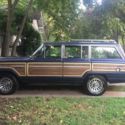 1988 Jeep Grand Wagoneer - Dark Blue w/ Wood Paneling & Tan Interior